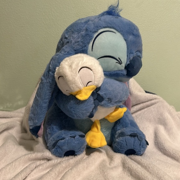 Disney's Stich hugging a Goose Large Stuffed Animal - Picture 2 of 4